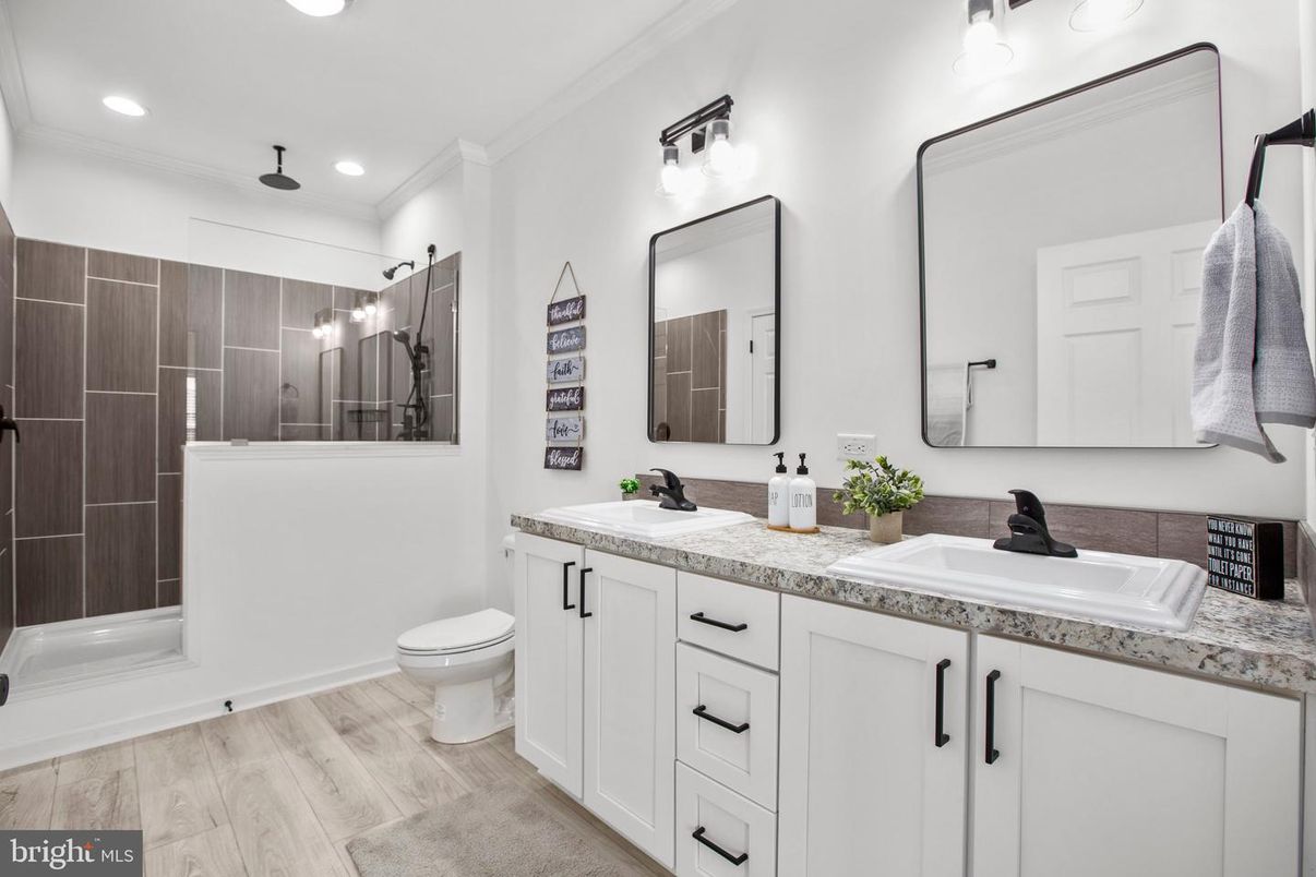 Bathroom, Dual Sink Vanities, Interior, Recessed Lighting, Wood Texture Flooring