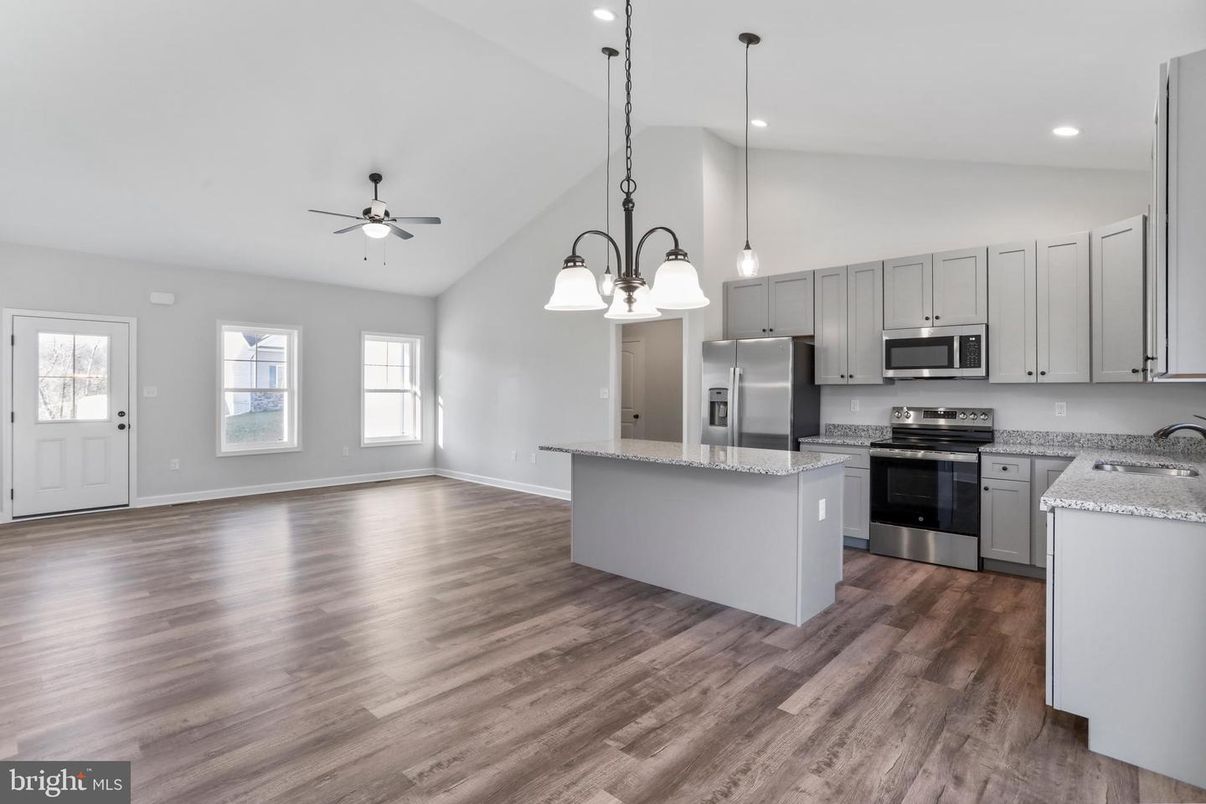 Chandelier, Interior, Kitchen, Pendant Lights, Recessed Lighting, Stainless Steel Appliances, Wood Texture Flooring