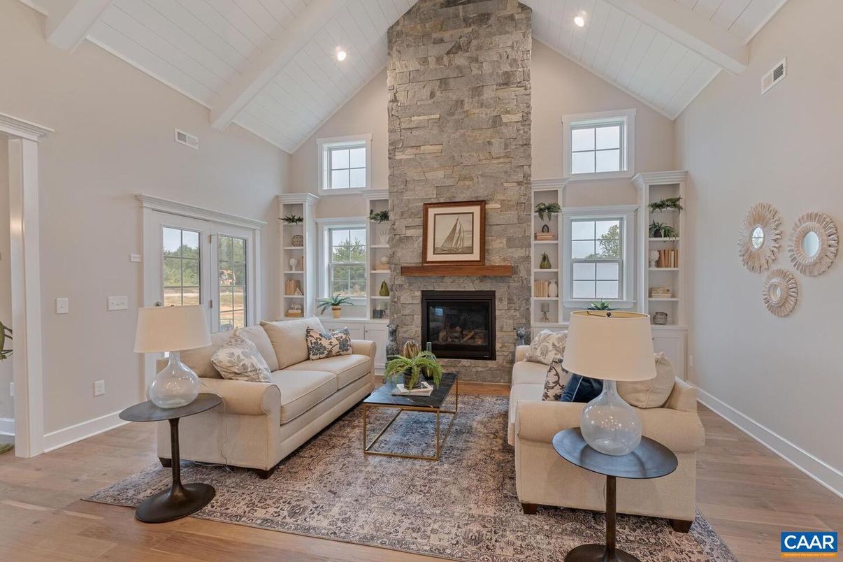 Fireplace, Interior, Living room, Recessed Lighting, Stone Walls, Wood Texture Flooring