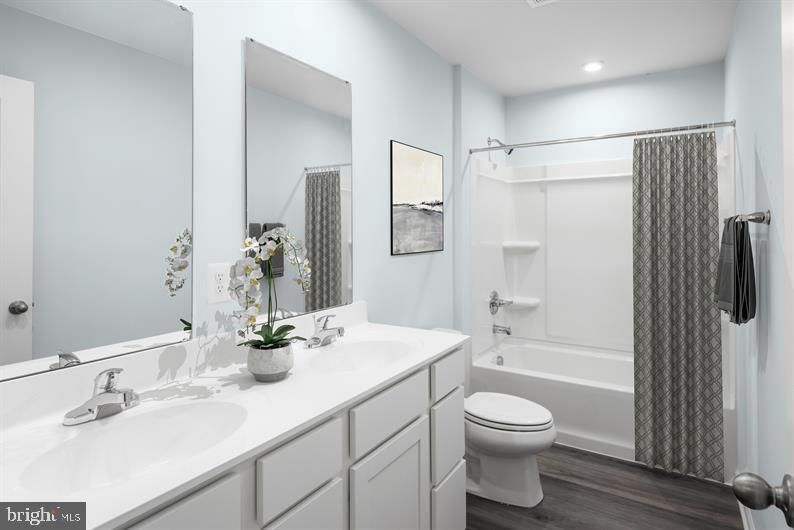Bathroom, Dual Sink Vanities, Interior, Recessed Lighting, Wood Texture Flooring