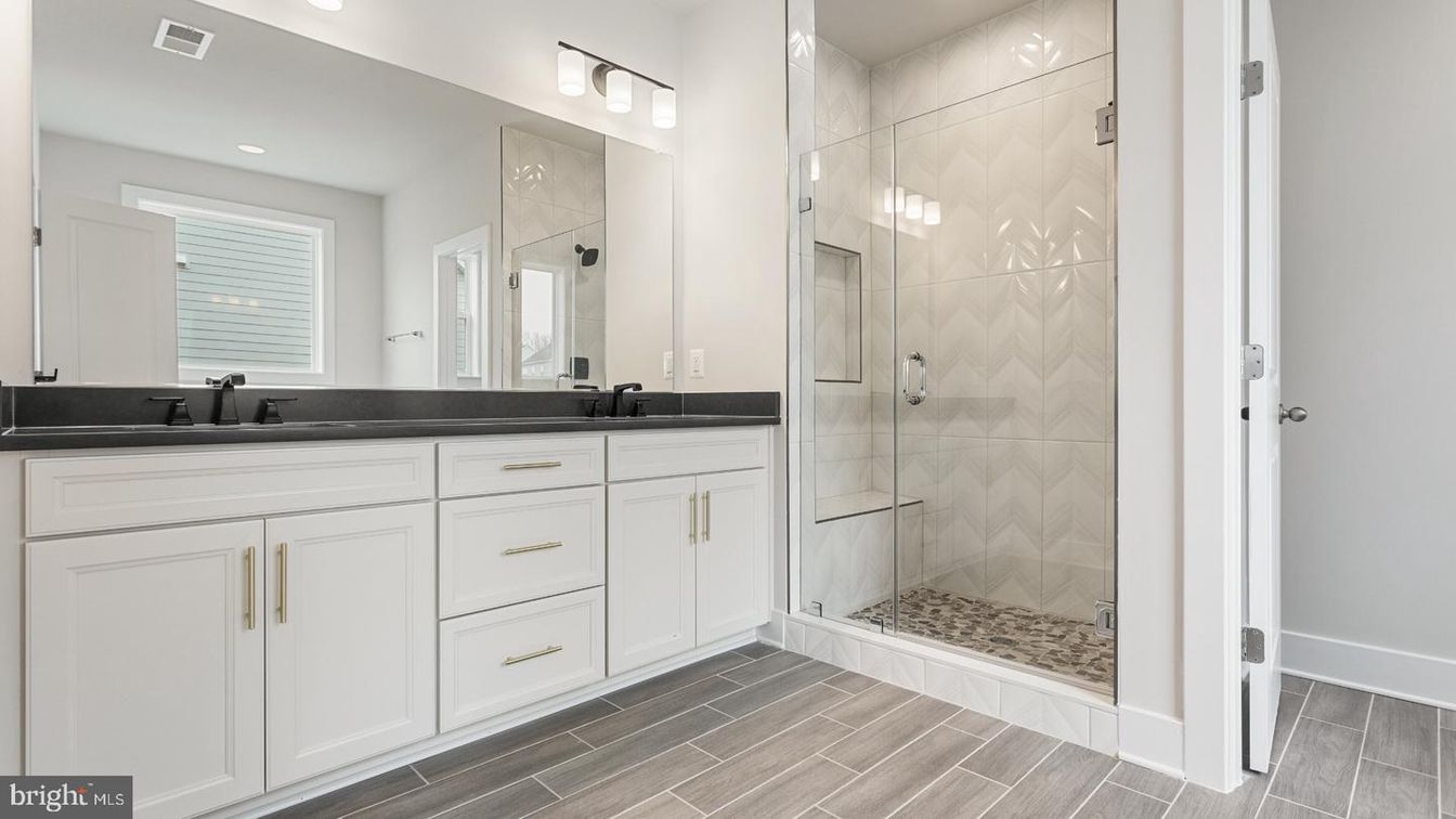 Bathroom, Dual Sink Vanities, Glass Shower, Interior, Recessed Lighting, Wood Texture Flooring
