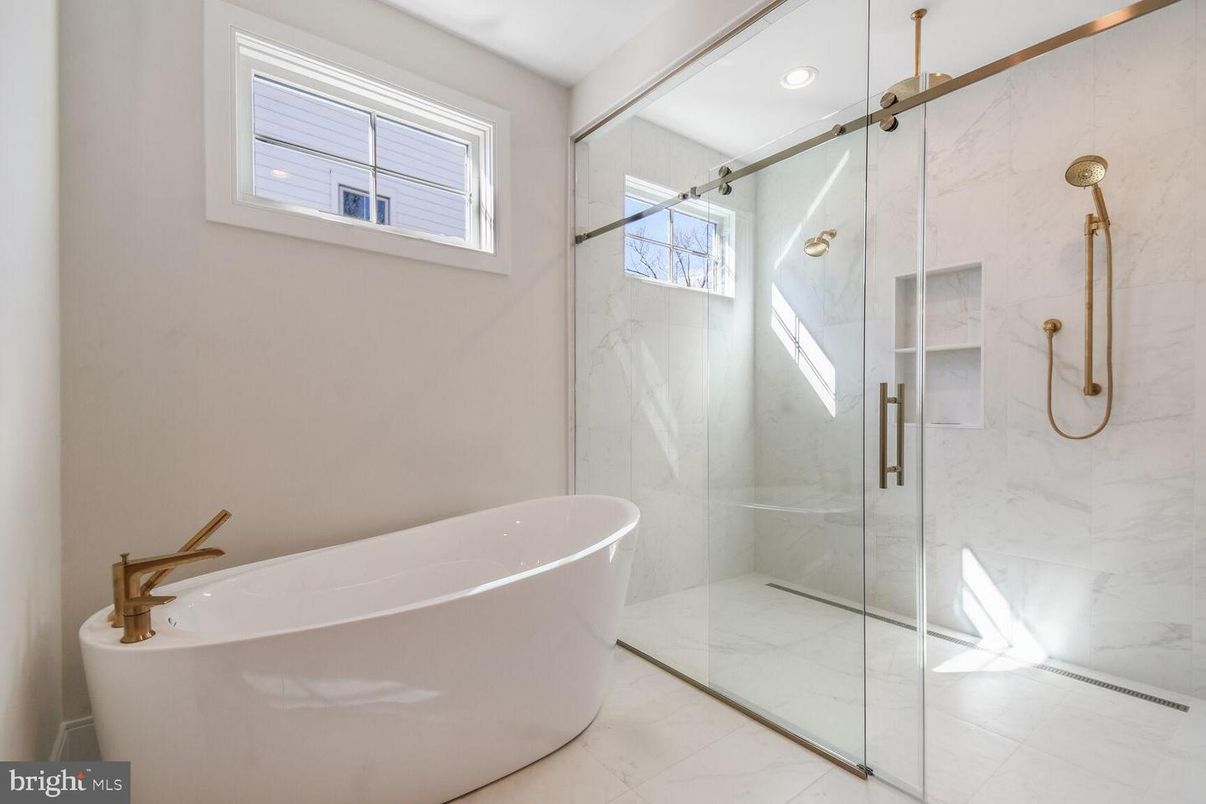 Bathroom, Free Standing Baths, Glass Shower, Interior, Marble, Marble Walls, Recessed Lighting