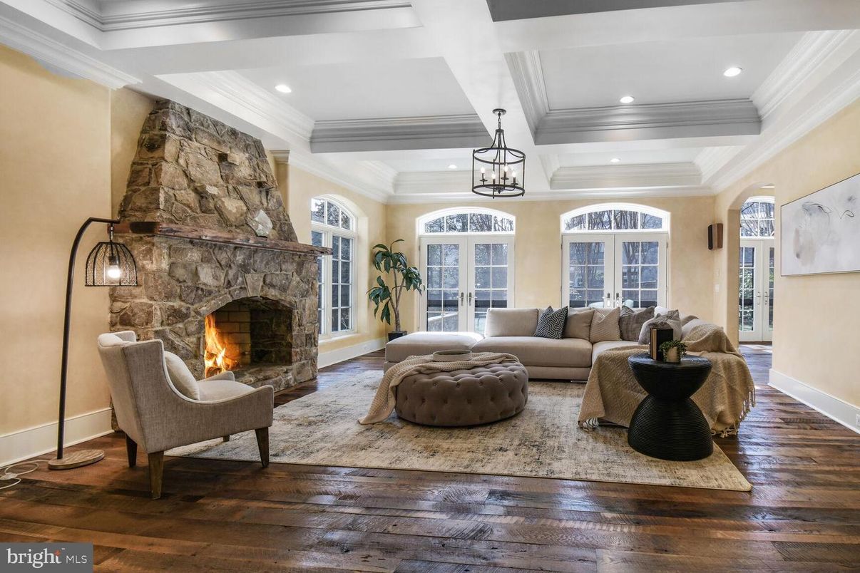 Fireplace, Interior, Living room, Recessed Lighting, Stone Walls, Wood Texture Flooring