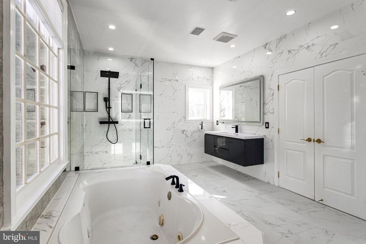 Bathroom, Dual Sink Vanities, Free Standing Baths, Glass Shower, Interior, Marble, Marble Walls, Recessed Lighting
