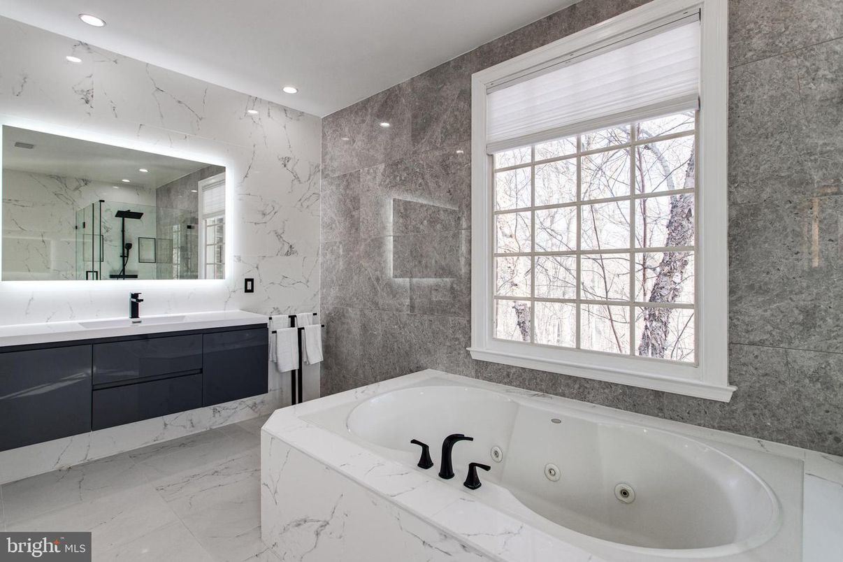 Bathroom, Dual Sink Vanities, Glass Shower, Interior, Marble, Marble Walls, Recessed Lighting