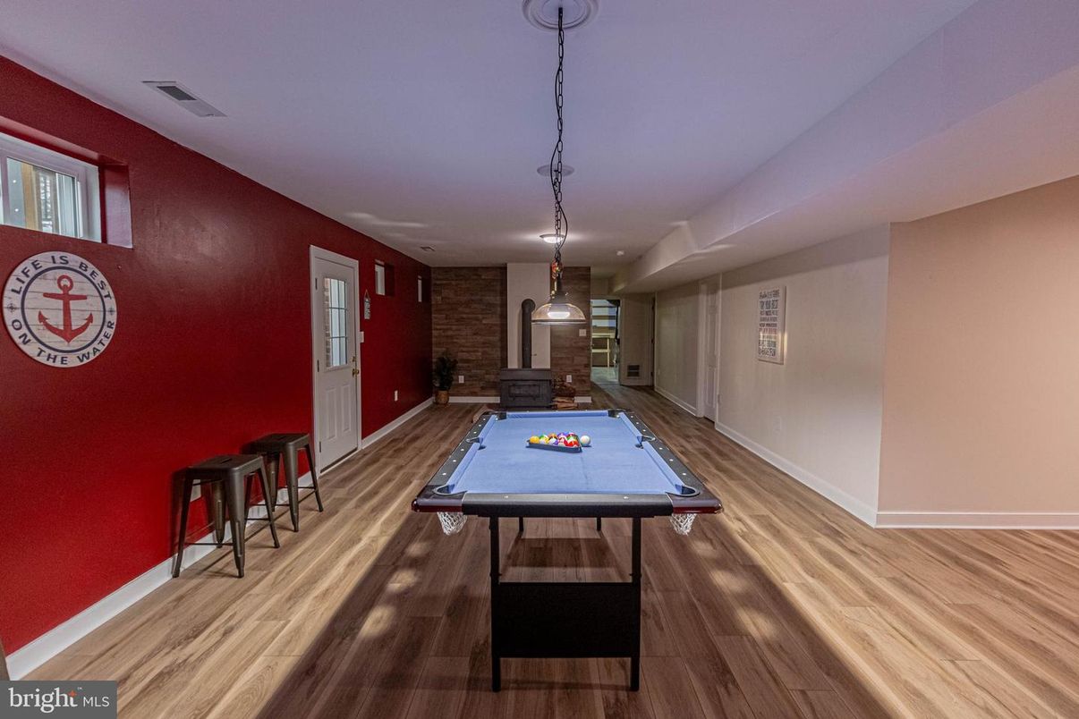 Billiard Table, Game Room, Interior, Pendant Lights, Recessed Lighting, Stone Walls, Wood Texture Flooring