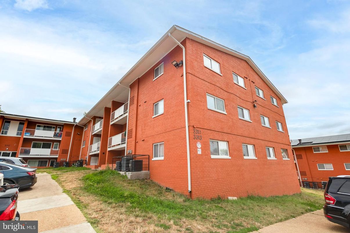 Exterior, Facade, Brick Facade, Condo Building