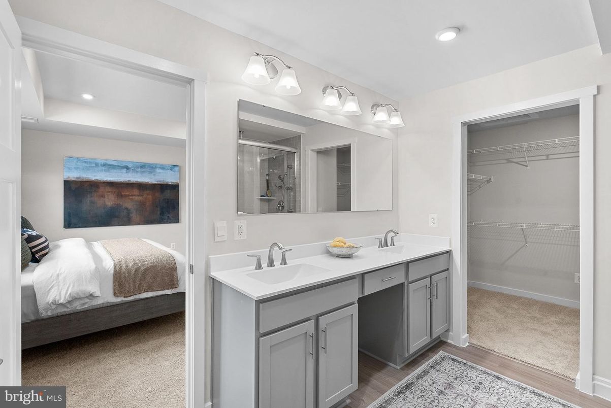 Bathroom, Bedroom, Dual Sink Vanities, Interior, Recessed Lighting, Walk-in Closets, Wood Texture Flooring