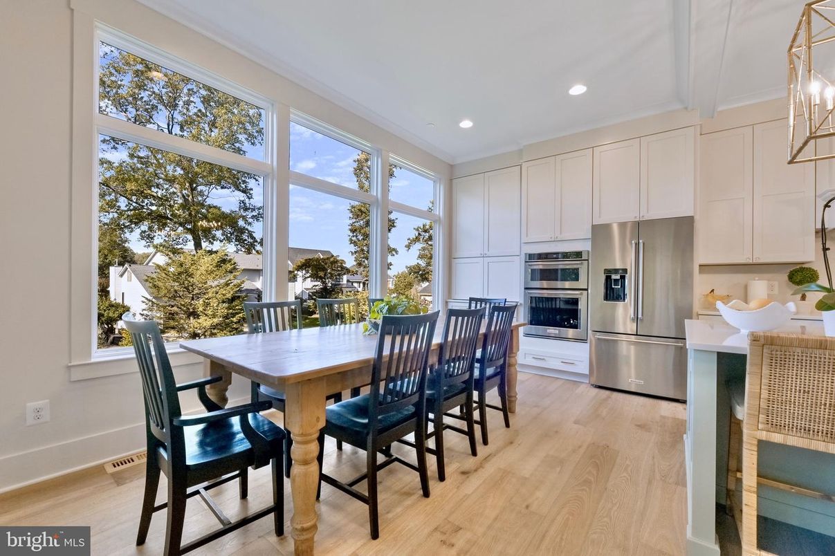 Dining room, Interior, Kitchen, Recessed Lighting, Stainless Steel Appliances, Wood Texture Flooring
