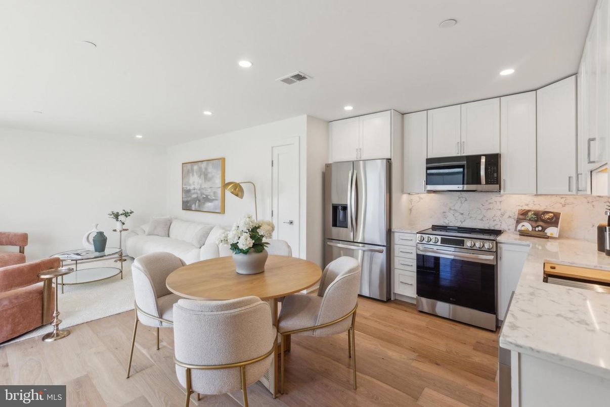 Dining room, Interior, Kitchen, Living room, Recessed Lighting, Stainless Steel Appliances, Wood Texture Flooring