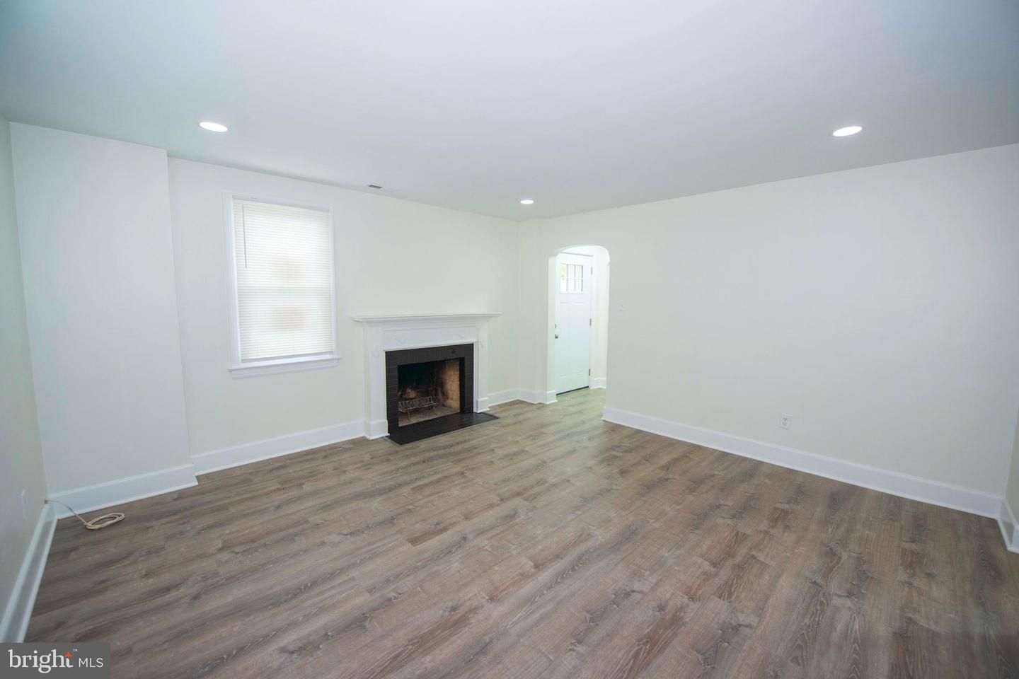 Empty room, Fireplace, Interior, Recessed Lighting, Wood Texture Flooring