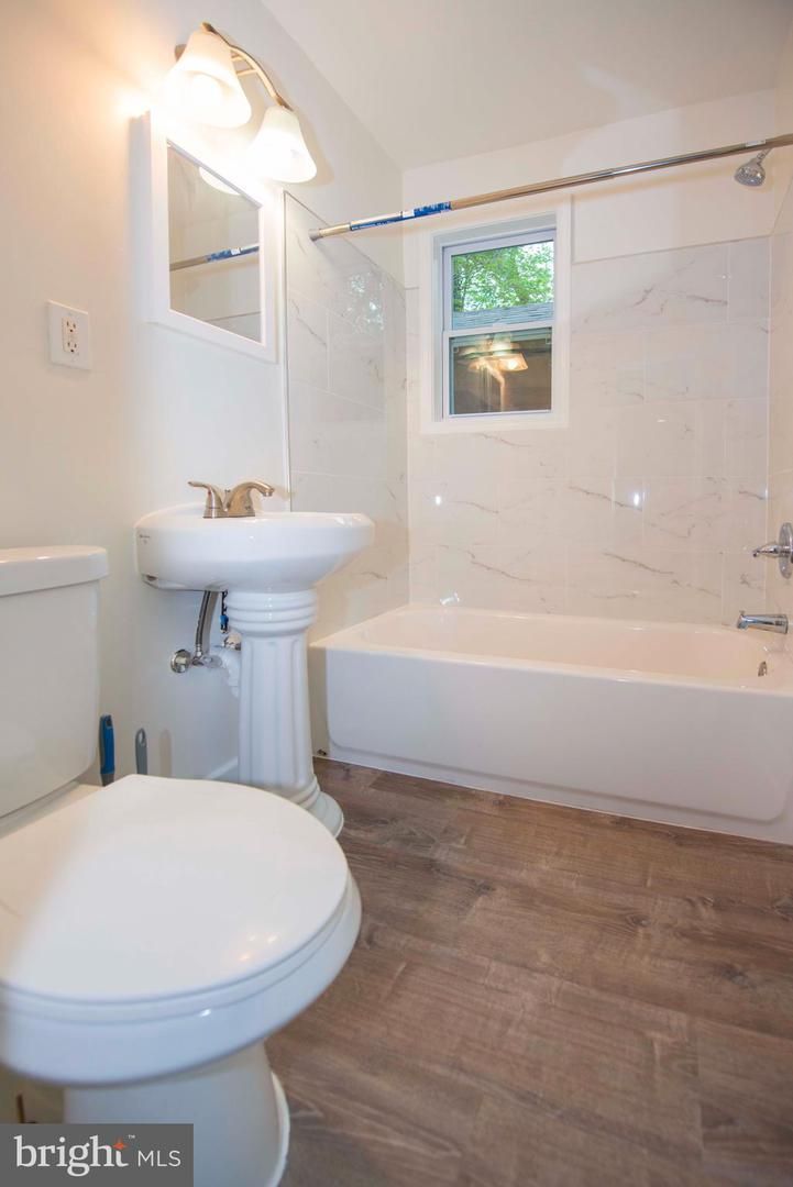 Bathroom, Free Standing Baths, Glass Shower, Interior, Marble Walls, Wood Texture Flooring