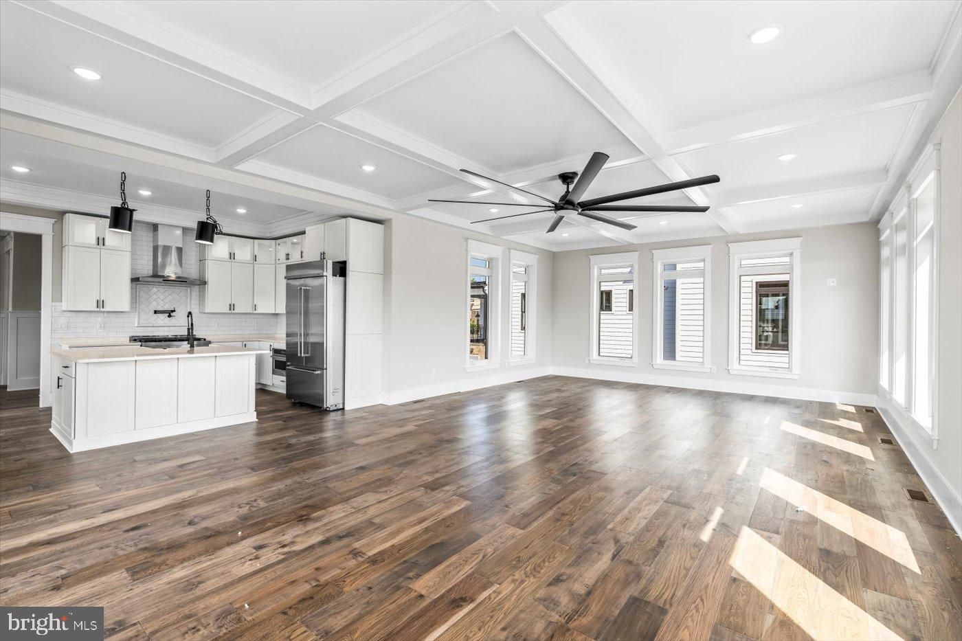 Empty room, Interior, Kitchen, Pendant Lights, Recessed Lighting, Stainless Steel Appliances, Wood Texture Flooring