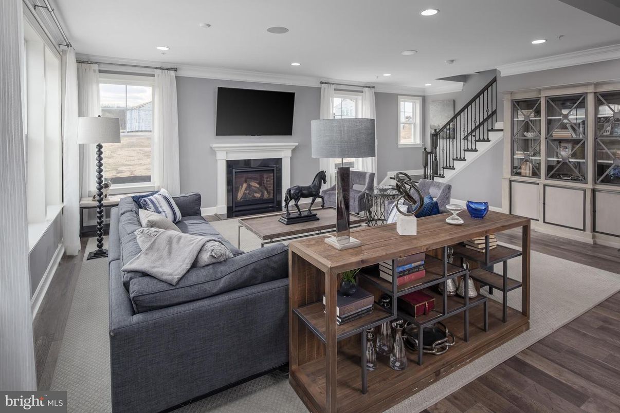 Dining room, Fireplace, Interior, Living room, Recessed Lighting, Wood Texture Flooring