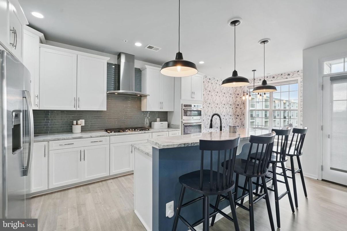 Interior, Kitchen, Pendant Lights, Recessed Lighting, Stainless Steel Appliances, Wood Texture Flooring