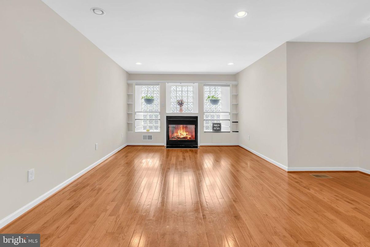 Empty room, Fireplace, Interior, Recessed Lighting, Wood Texture Flooring