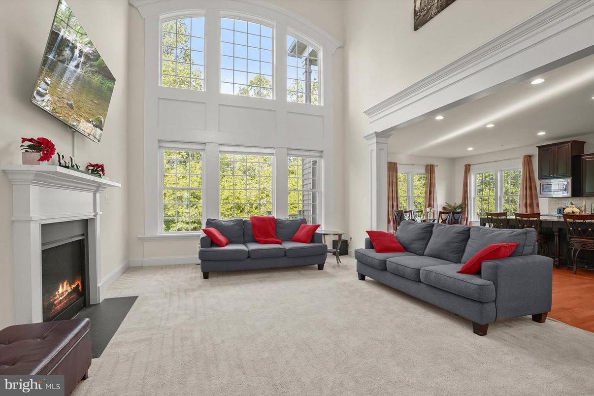 Dining room, Fireplace, Interior, Living room, Recessed Lighting, Wood Texture Flooring