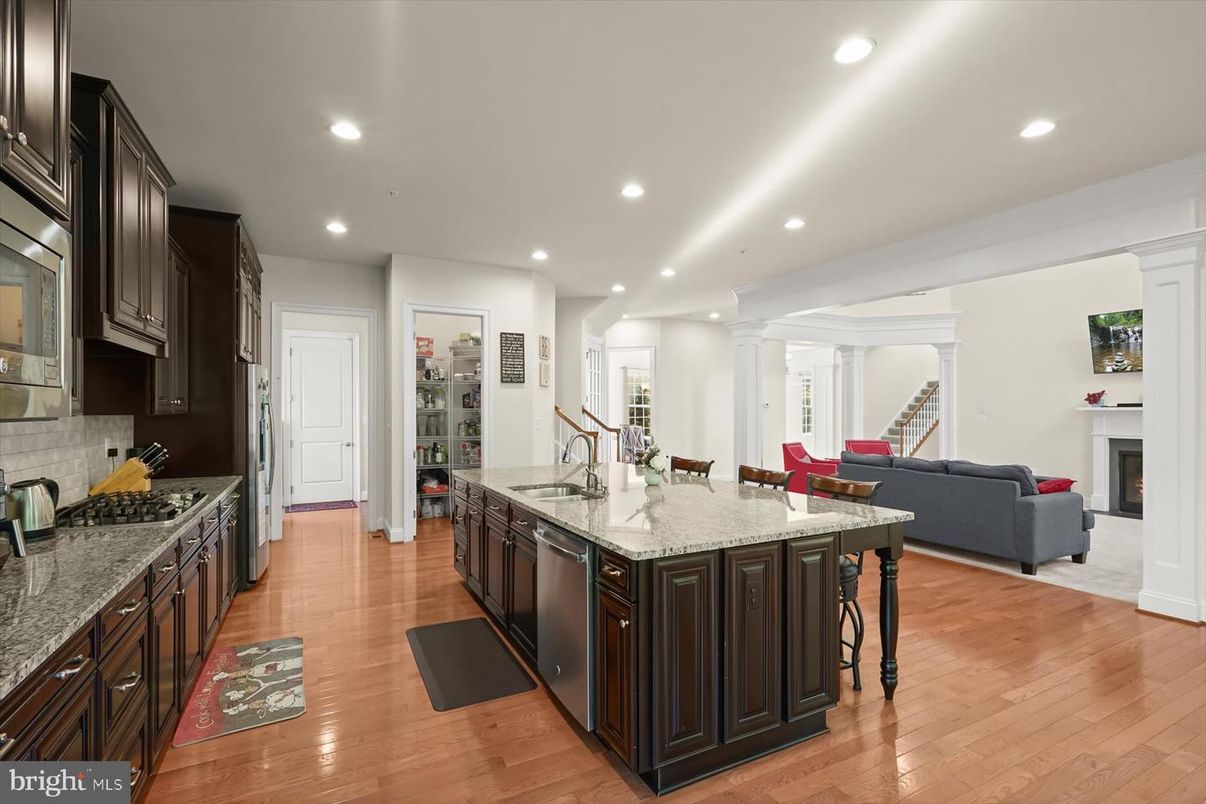 Fireplace, Interior, Kitchen, Living room, Recessed Lighting, Wood Texture Flooring