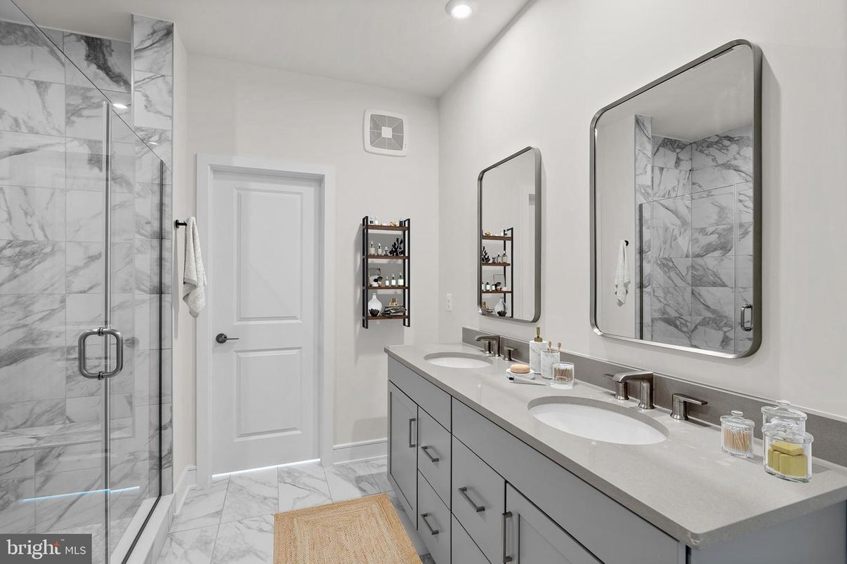 Bathroom, Dual Sink Vanities, Glass Shower, Interior, Marble, Marble Walls, Recessed Lighting