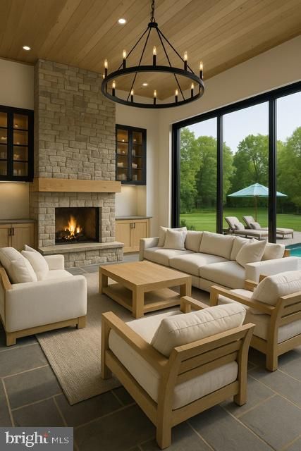 Chandelier, Fireplace, Interior, Living room, Recessed Lighting, Stone Walls, Wooden Ceilings