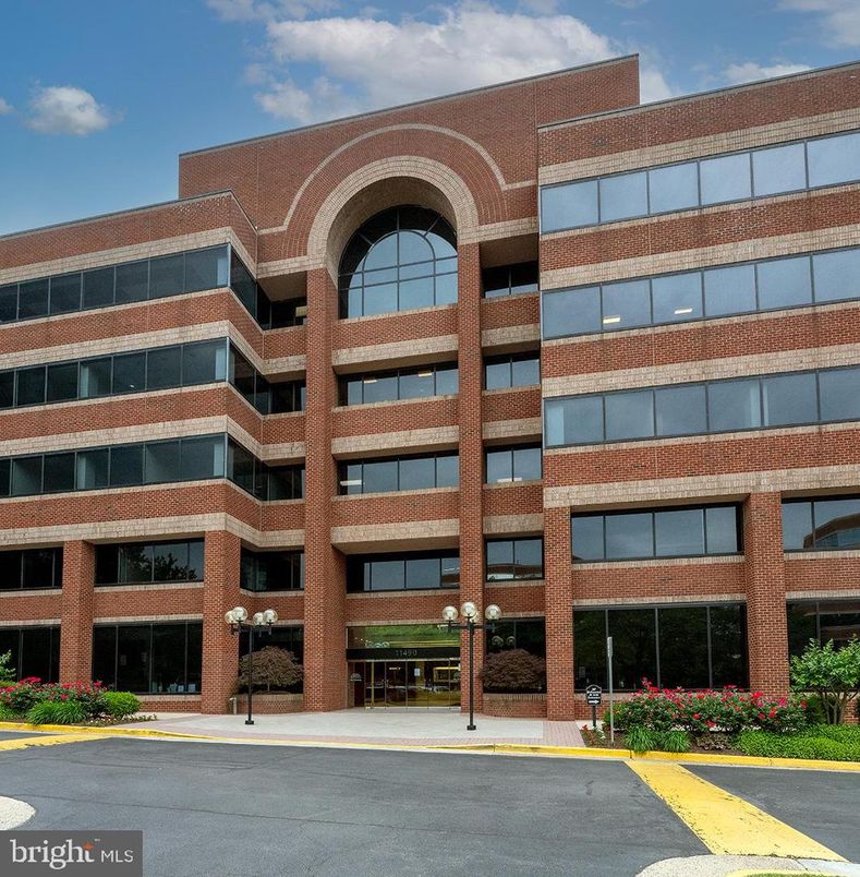 Exterior, Facade, Brick Facade, Condo Building