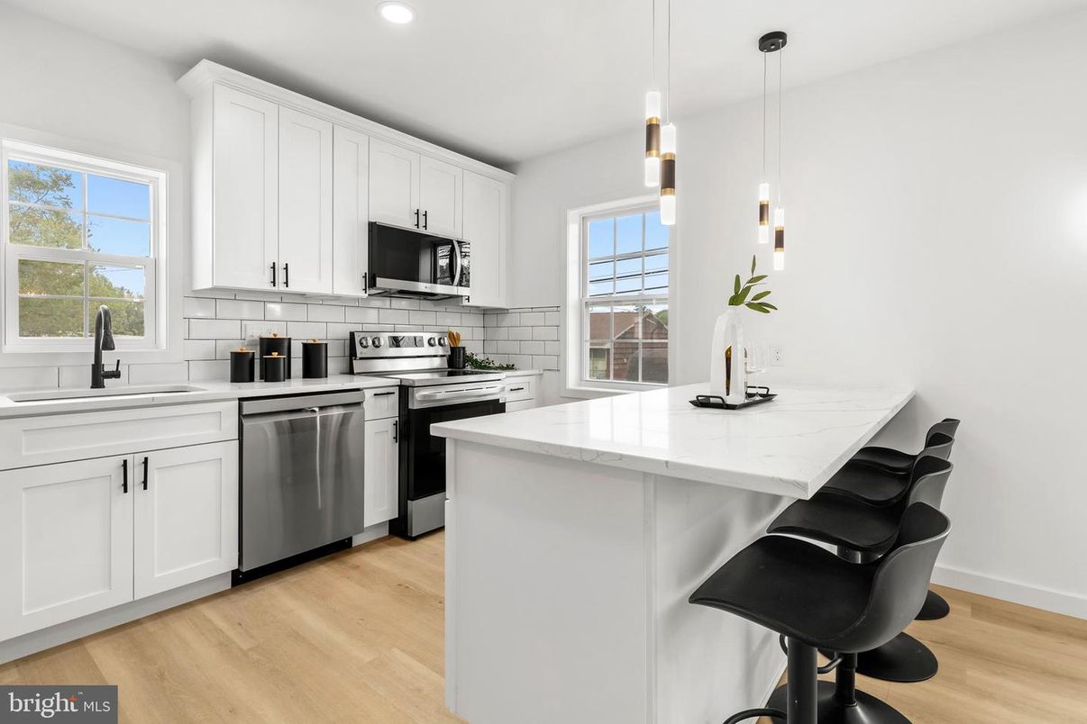 Interior, Kitchen, Pendant Lights, Recessed Lighting, Stainless Steel Appliances, Wood Texture Flooring