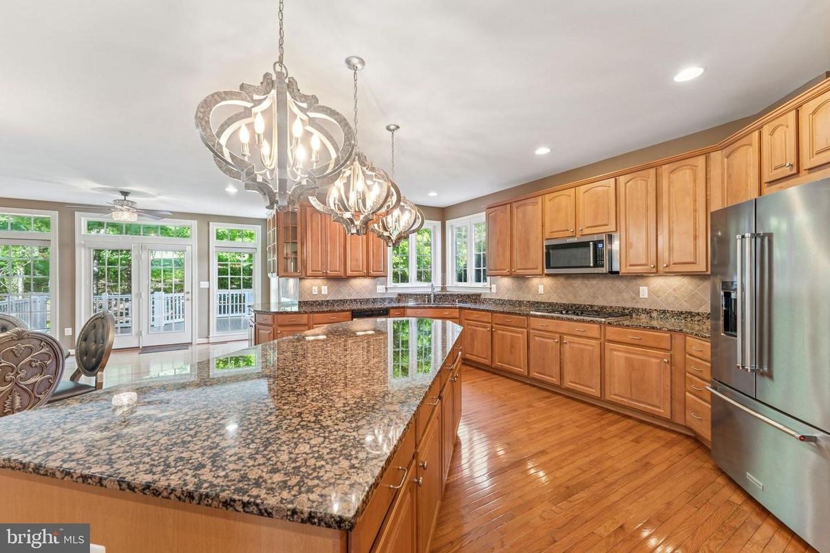Chandelier, Interior, Kitchen, Recessed Lighting, Stainless Steel Appliances, Wood Texture Flooring