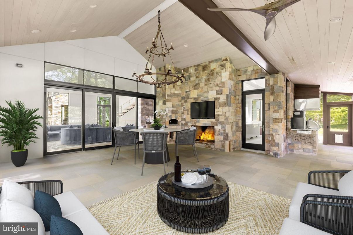 Chandelier, Dining room, Fireplace, Interior, Living room, Pendant Lights, Recessed Lighting, Stone Walls