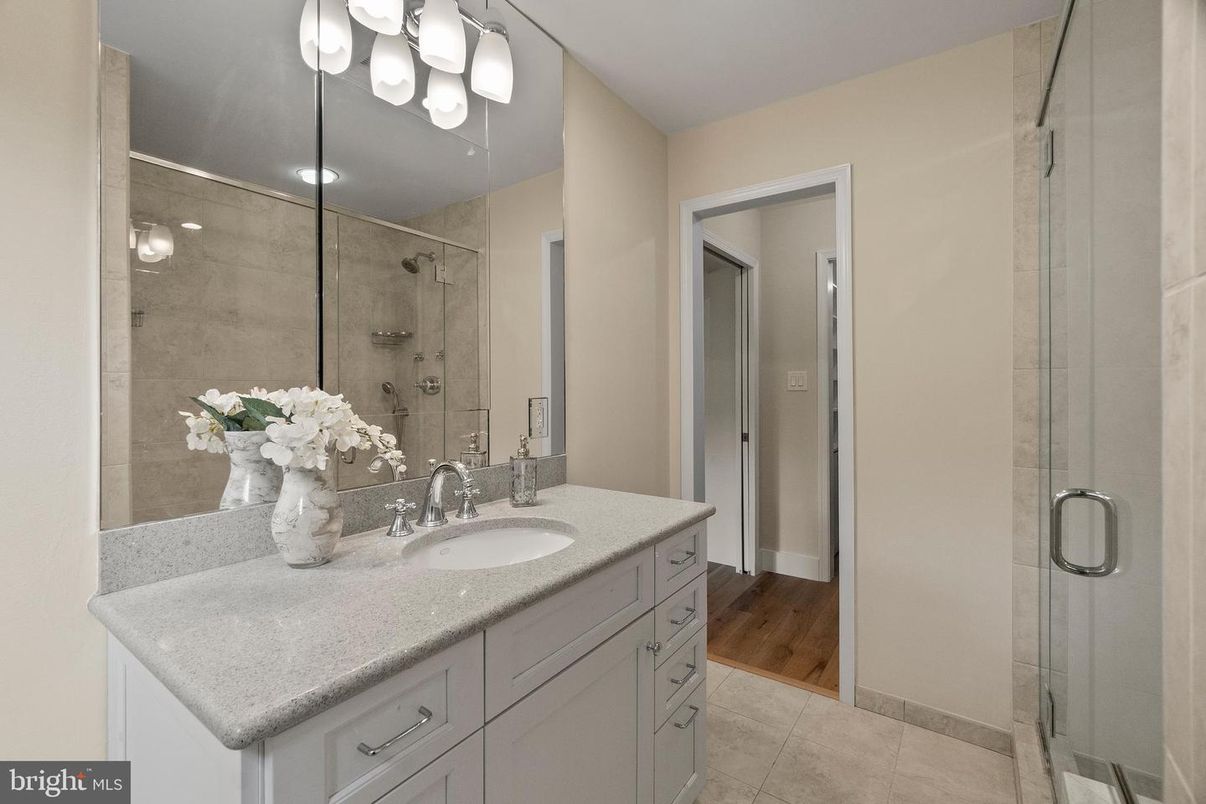 Bathroom, Dual Sink Vanities, Glass Shower, Interior, Wood Texture Flooring