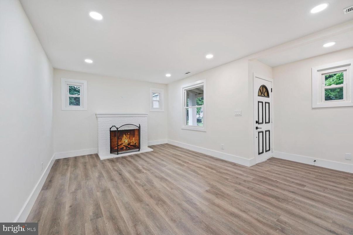 Empty room, Fireplace, Interior, Recessed Lighting, Wood Texture Flooring