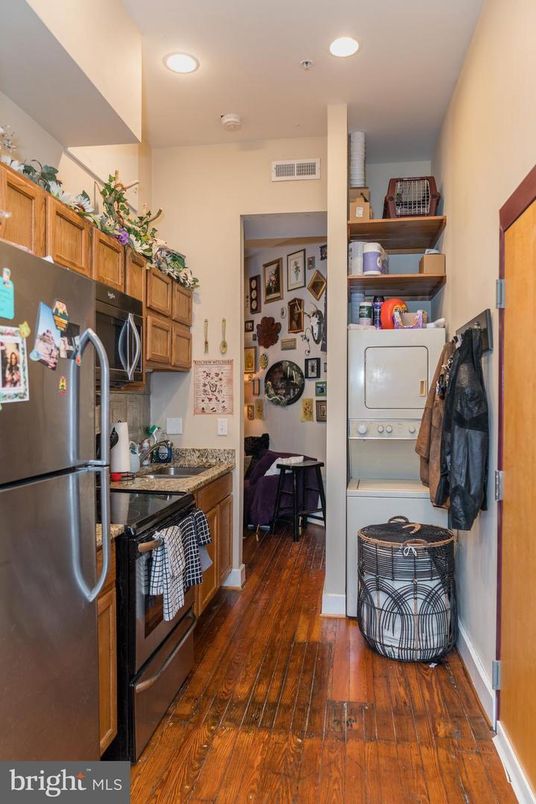 Interior, Kitchen, Recessed Lighting, Washer, Wood Texture Flooring