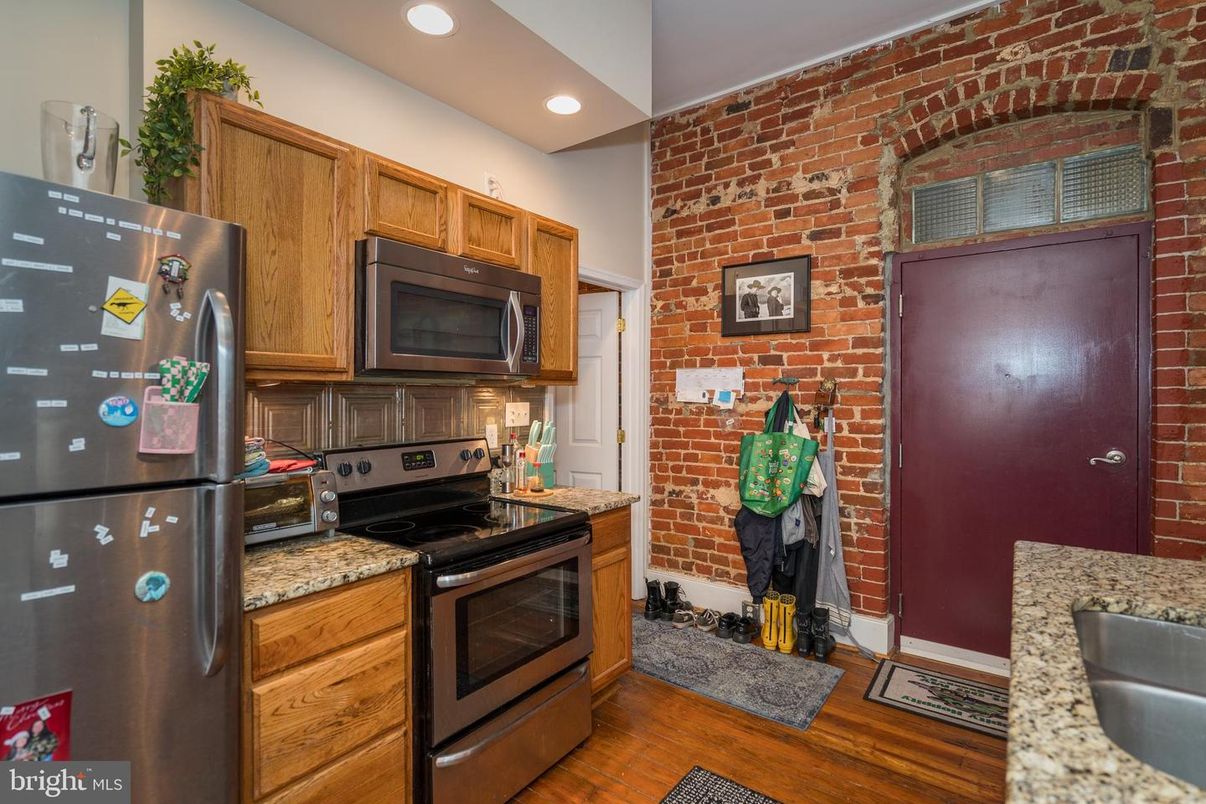 Interior, Kitchen, Recessed Lighting, Stainless Steel Appliances, Stone Walls, Wood Texture Flooring