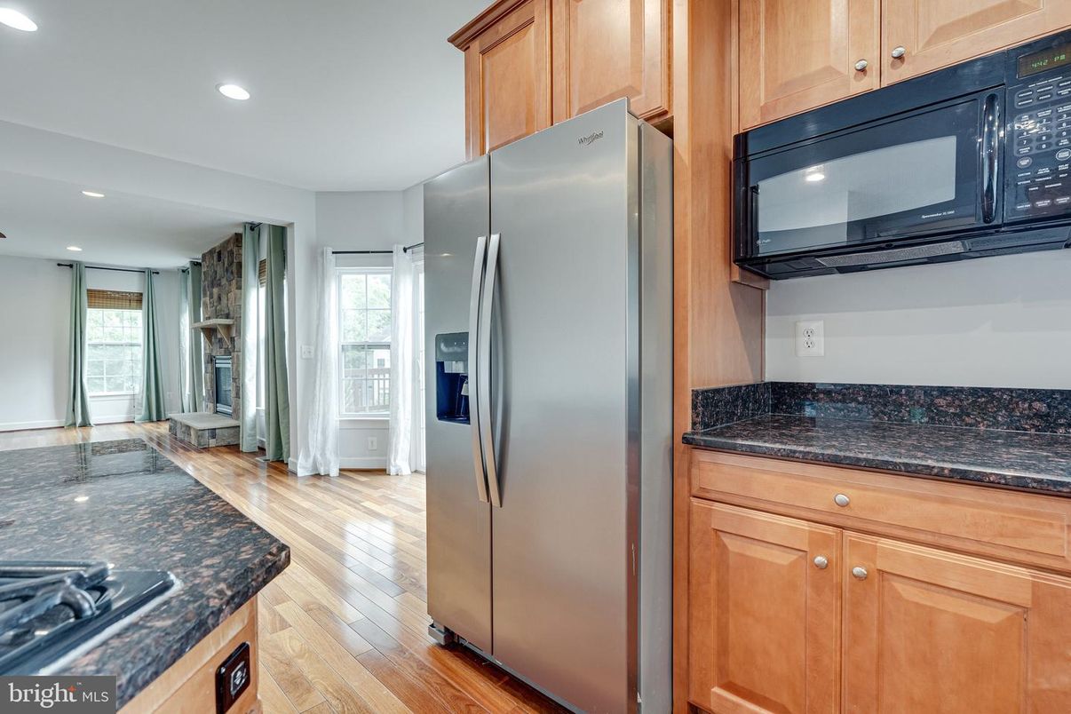 Fireplace, Interior, Kitchen, Recessed Lighting, Wood Texture Flooring