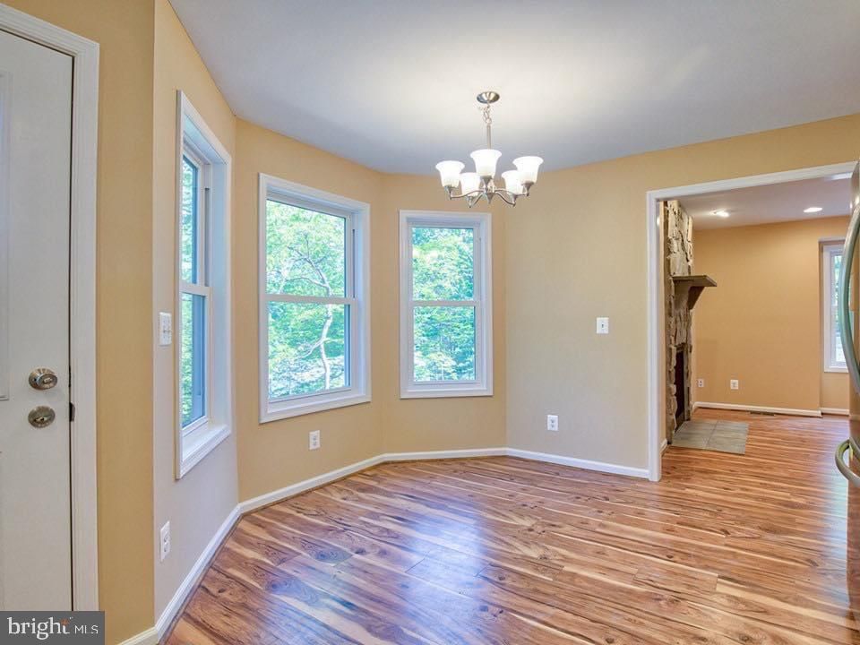 Chandelier, Empty room, Interior, Recessed Lighting, Wood Texture Flooring