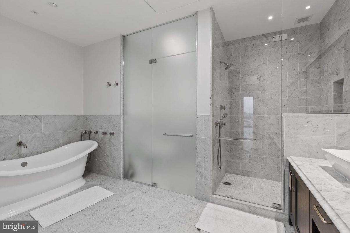 Bathroom, Free Standing Baths, Glass Shower, Interior, Marble Walls, Recessed Lighting