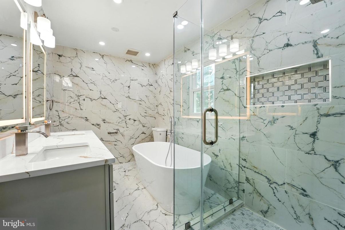 Bathroom, Free Standing Baths, Glass Shower, Interior, Marble, Marble Walls, Recessed Lighting
