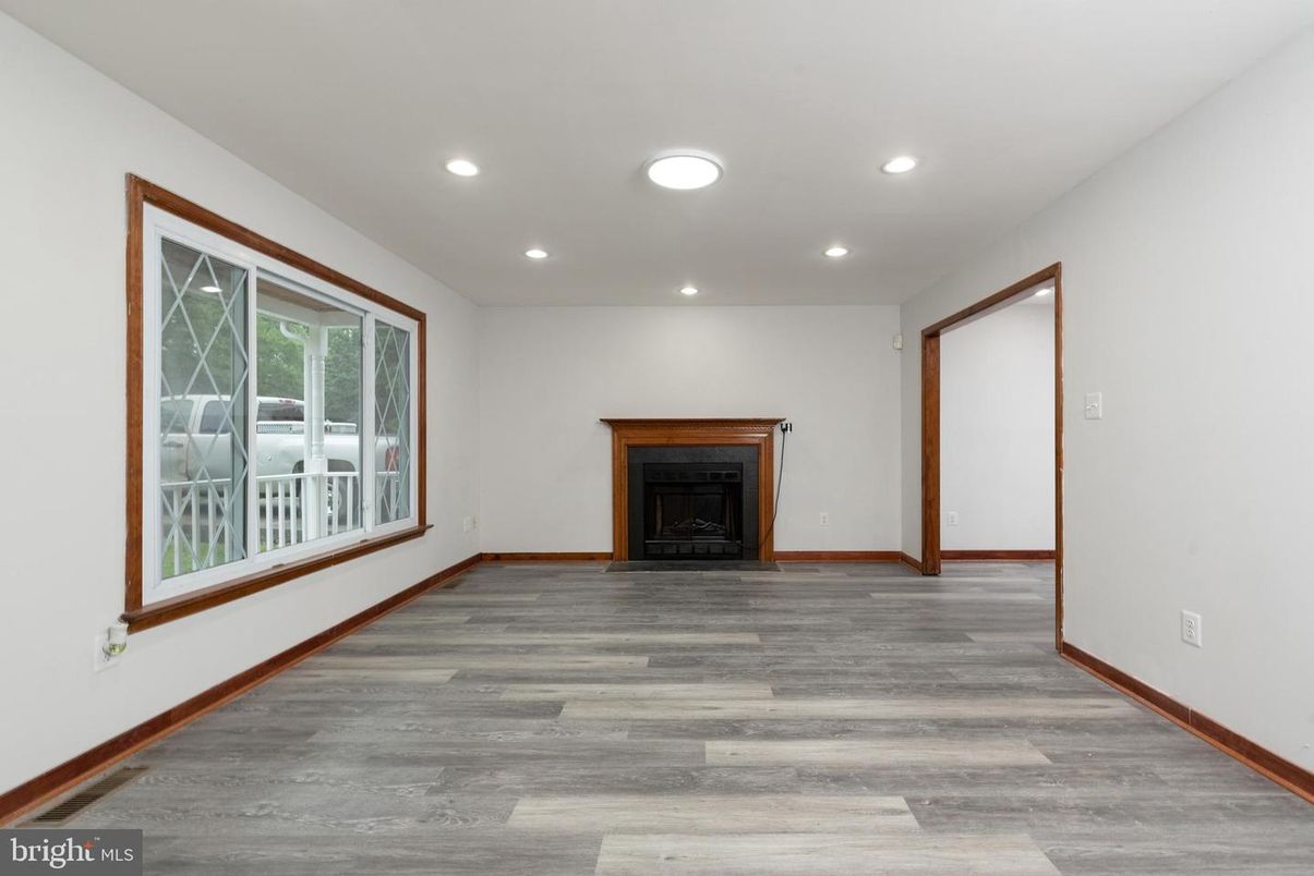 Empty room, Fireplace, Interior, Recessed Lighting, Wood Texture Flooring