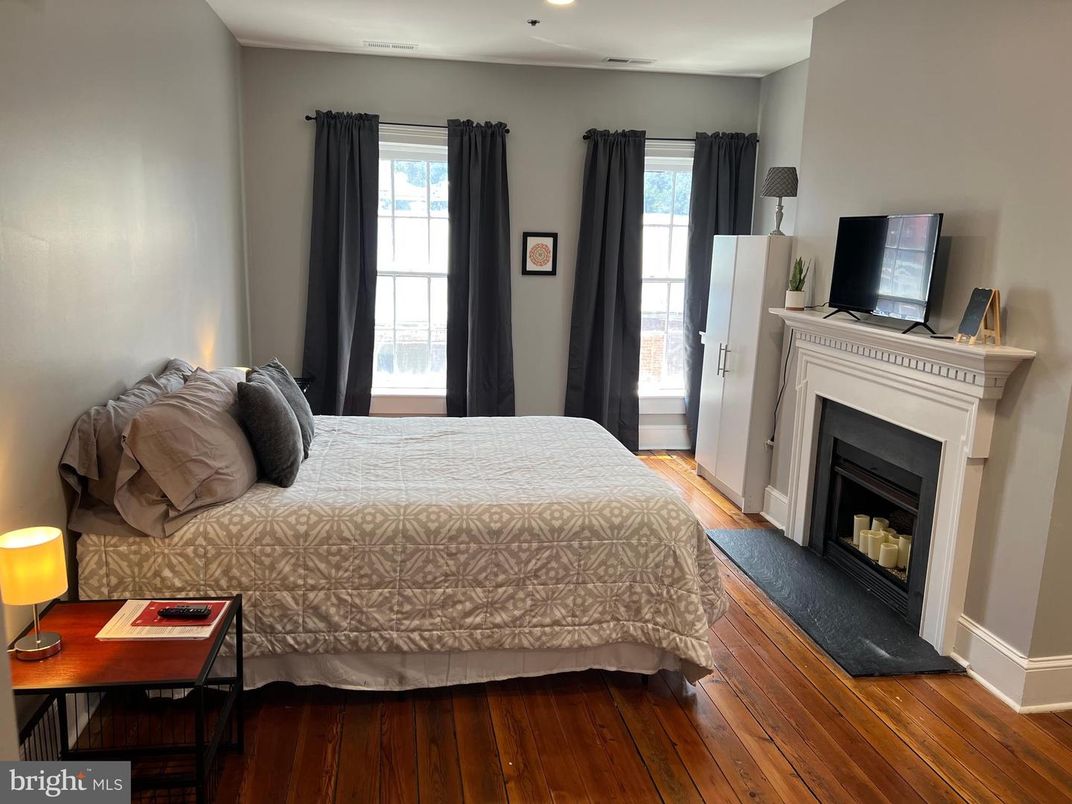 Bedroom, Fireplace, Interior, Recessed Lighting, Wood Texture Flooring