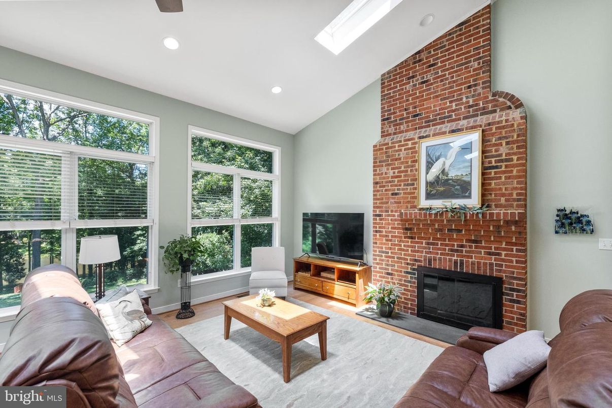 Fireplace, Interior, Living room, Recessed Lighting, Stone Walls, Wood Texture Flooring