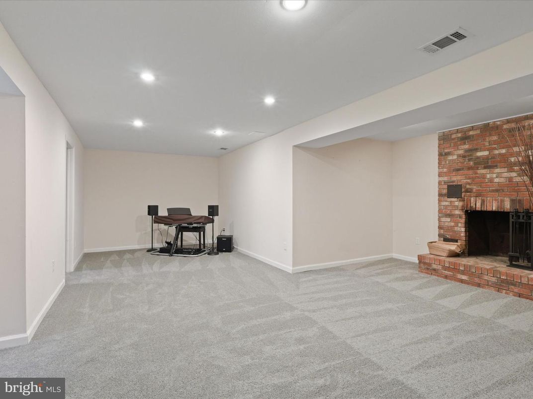 Fireplace, Interior, Piano, Recessed Lighting, Stone Walls