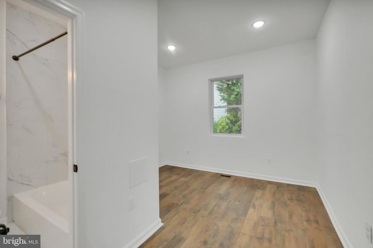 Empty room, Interior, Marble Walls, Recessed Lighting, Wood Texture Flooring