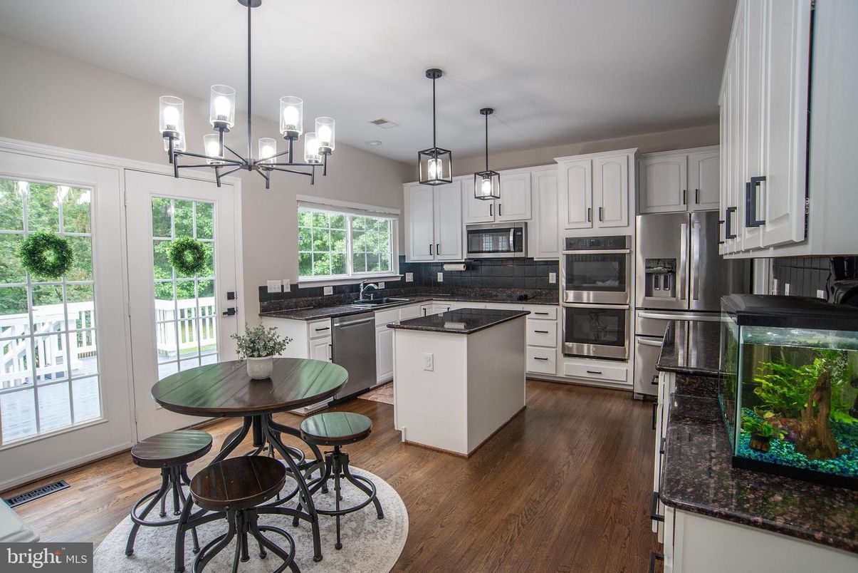 Chandelier, Interior, Kitchen, Pendant Lights, Stainless Steel Appliances, Wood Texture Flooring