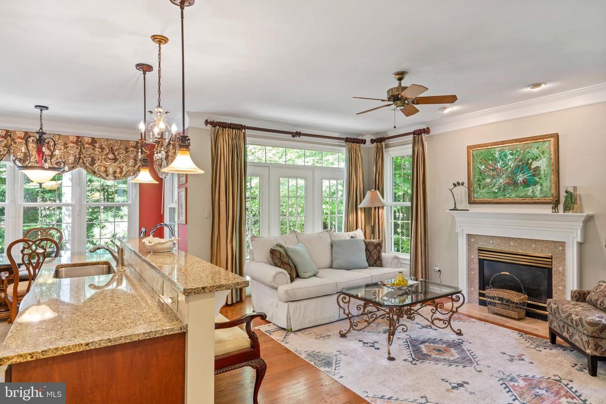 Chandelier, Fireplace, Interior, Living room, Pendant Lights, Recessed Lighting, Wood Texture Flooring