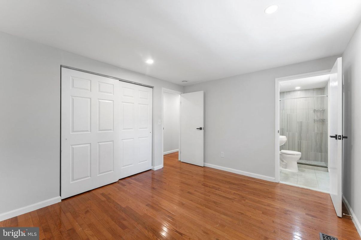 Bathroom, Empty room, Glass Shower, Interior, Recessed Lighting, Wood Texture Flooring