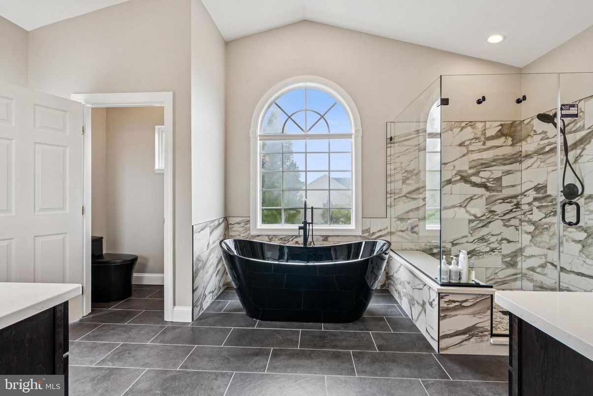Bathroom, Free Standing Baths, Glass Shower, Interior, Marble Walls, Recessed Lighting