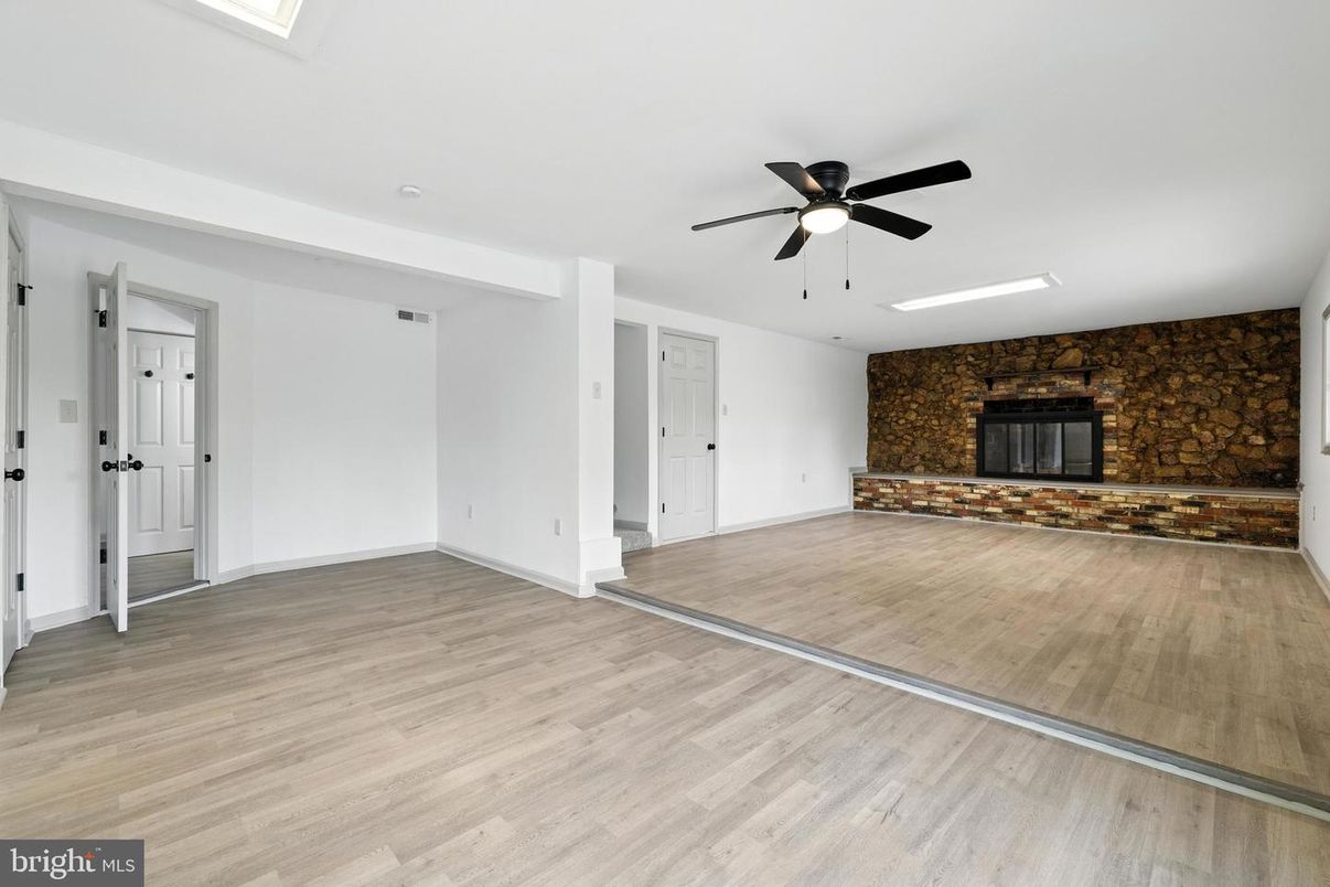 Empty room, Fireplace, Interior, Stone Walls, Wood Texture Flooring