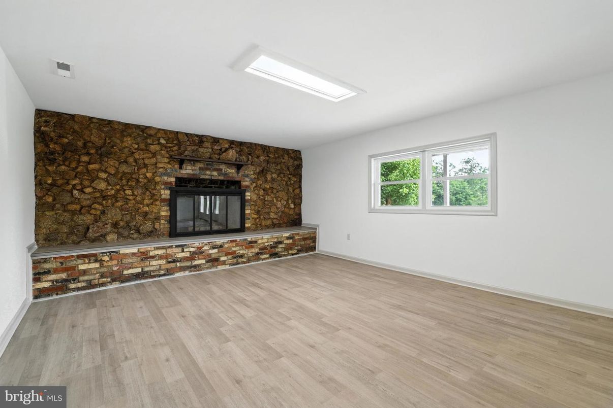 Empty room, Fireplace, Interior, Stone Walls, Wood Texture Flooring