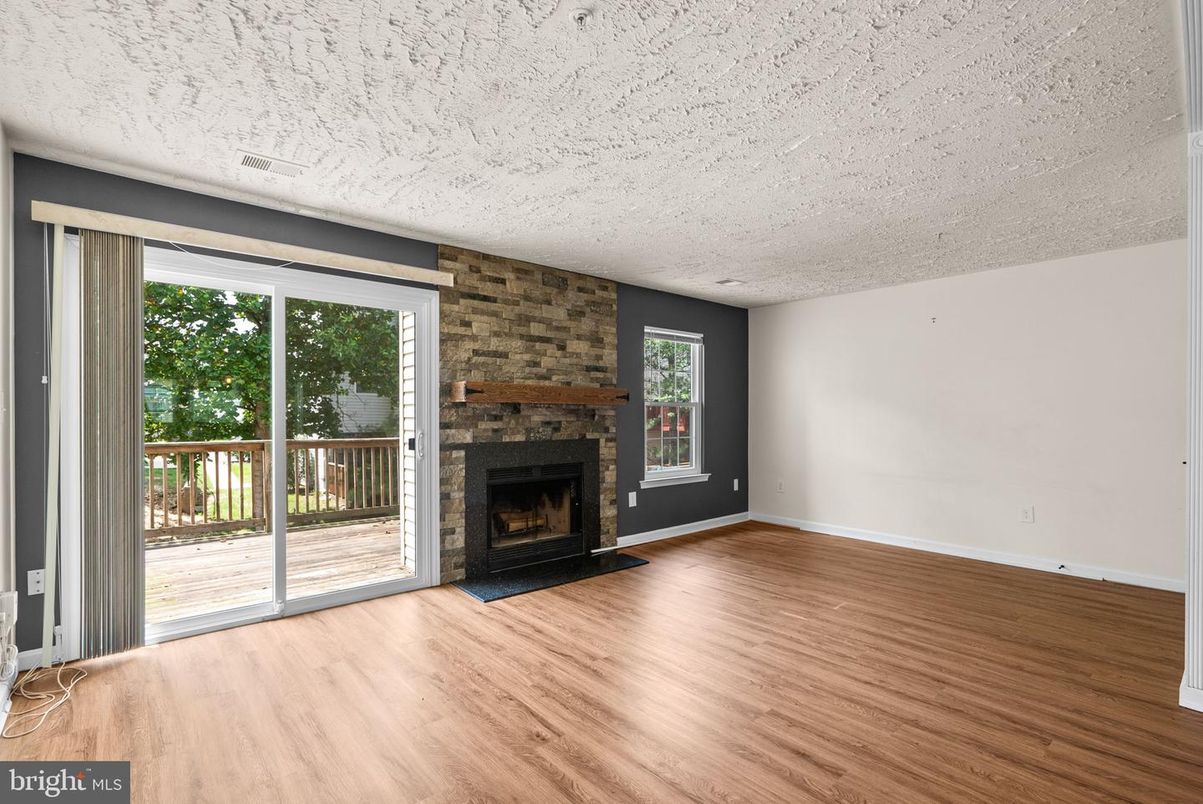 Empty room, Fireplace, Interior, Stone Walls, Wood Texture Flooring