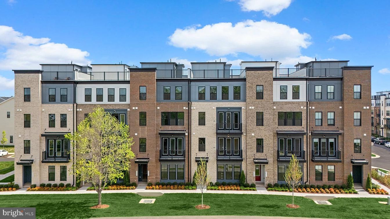 Exterior, Facade, Brick Facade, Condo Building