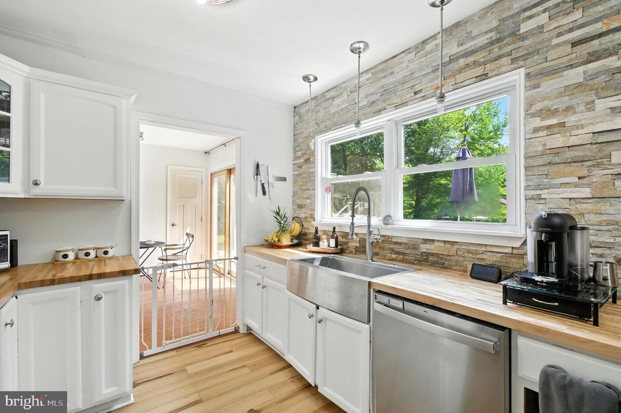 Interior, Kitchen, Pendant Lights, Stainless Steel Appliances, Stone Walls, Wood Texture Flooring
